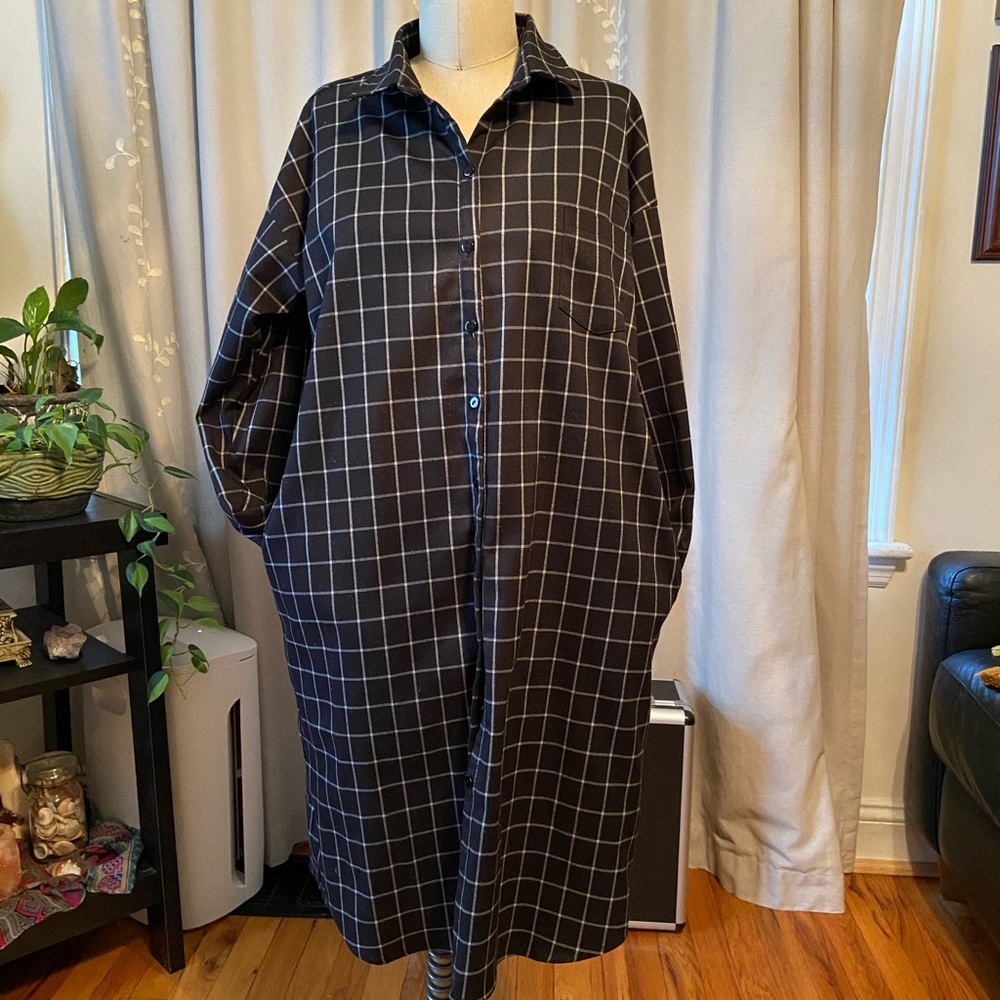 Long sleeve black shirt dress.